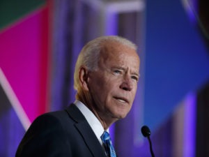 Former vice president and current Democratic presidential candidate Joe Biden apologized on Tuesday for using the word "lynching" in 1998 to describe the impeachment of then-President Bill Clinton. Above, Biden speaks at this year's Democratic Women's Leadership Forum.