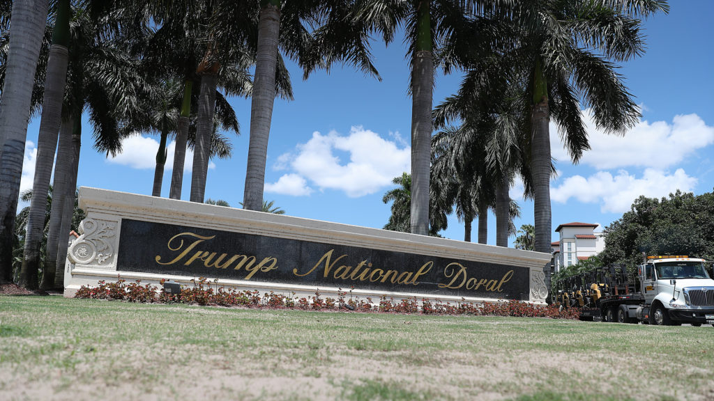 The entrance to the Trump National Doral golf resort just outside of Miami. President Trump's continued ownership and promotion of his resorts while serving in office has been controversial and is the subject of multiple investigations and lawsuits. CREDIT: Joe Raedle/Getty Images