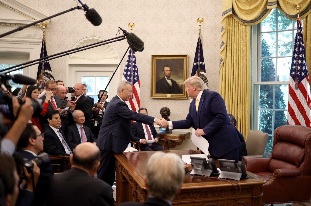 U.S. President Donald Trump shakes hands with Chinese Vice Premier Liu He in the Oval Office at the White House October 11, 2019 in Washington, DC. President Trump announced a 'phase one' partial trade deal with China. Win McNamee/Getty Images