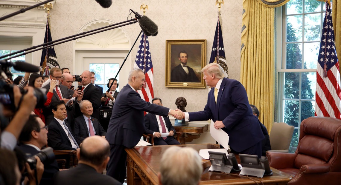 U.S. President Donald Trump shakes hands with Chinese Vice Premier Liu He in the Oval Office at the White House October 11, 2019 in Washington, DC. President Trump announced a 'phase one' partial trade deal with China. Win McNamee/Getty Images