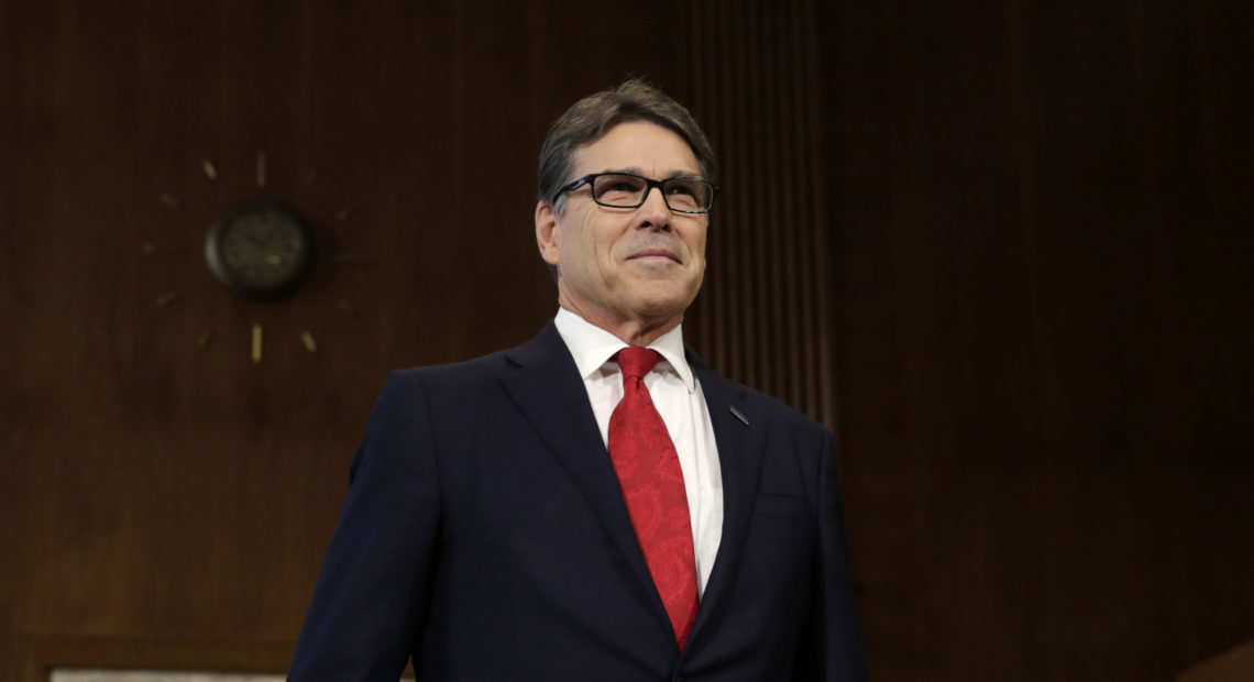 Former Texas Gov. Rick Perry takes a seat before the Senate Energy and Natural Resources Committee hearing on his nomination to be energy secretary on Jan. 19, 2017. CREDIT: Yuri Gripas/AFP/Getty Images