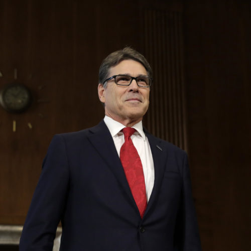 Former Texas Gov. Rick Perry takes a seat before the Senate Energy and Natural Resources Committee hearing on his nomination to be energy secretary on Jan. 19, 2017. CREDIT: Yuri Gripas/AFP/Getty Images