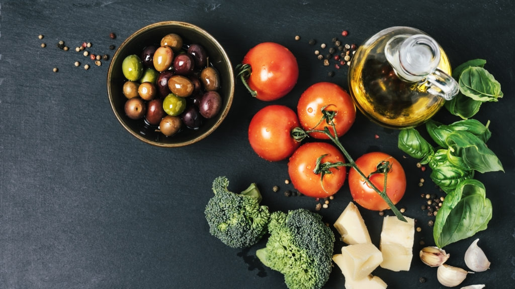 Depression symptoms dropped significantly in a group of young adults who ate a Mediterranean-style diet for three weeks. It's the latest study to show that food can influence mental health. Claudia Totir/Getty Images