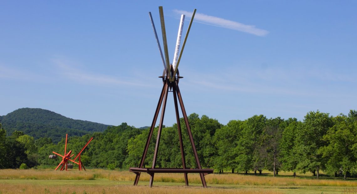 View of the south fields, all works by Mark di Suvero. Left to right: Figolu, 2005–11. Courtesy the artist and Spacetime C.C. E=MC2 , 1996-97. Courtesy the artist and Spacetime C.C. ©Mark di Suvero. Courtesy Storm King Art Center