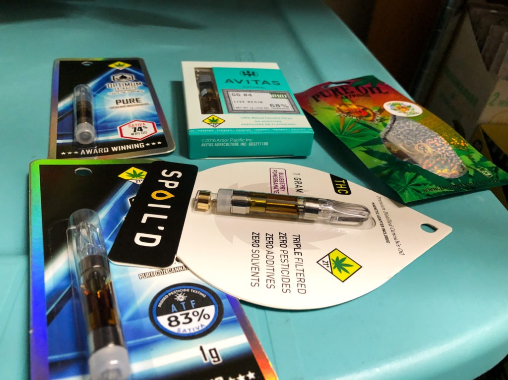 THC vape cartridges are a popular product in Washington's legal marijuana shops. A new ban on flavored versions of marijuana and nicotine vaping products recently went into effect across the state, and will remain in place at least four months. CREDIT: Will Stone for NPR