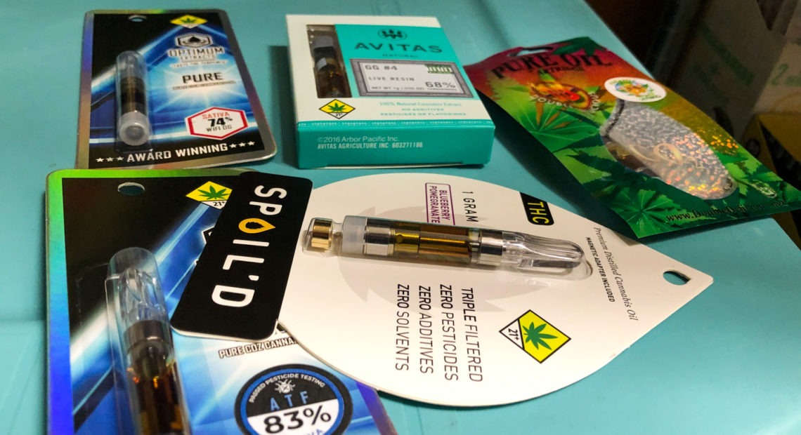 THC vape cartridges are a popular product in Washington's legal marijuana shops. A new ban on flavored versions of marijuana and nicotine vaping products recently went into effect across the state, and will remain in place at least four months. CREDIT: Will Stone for NPR