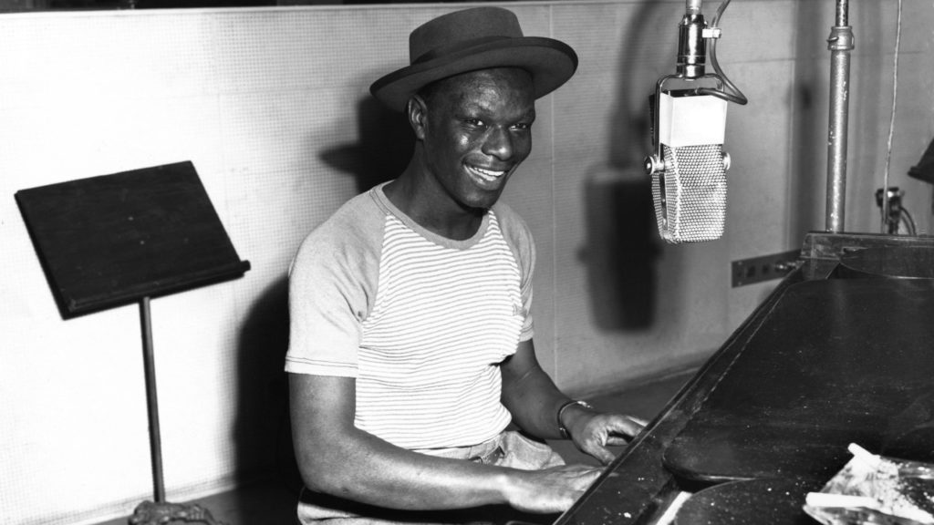 Nat King Cole playing piano in the Capitol Records recording studio on May 23, 1945. Capitol Records Photo Archive/Courtesy of the artist