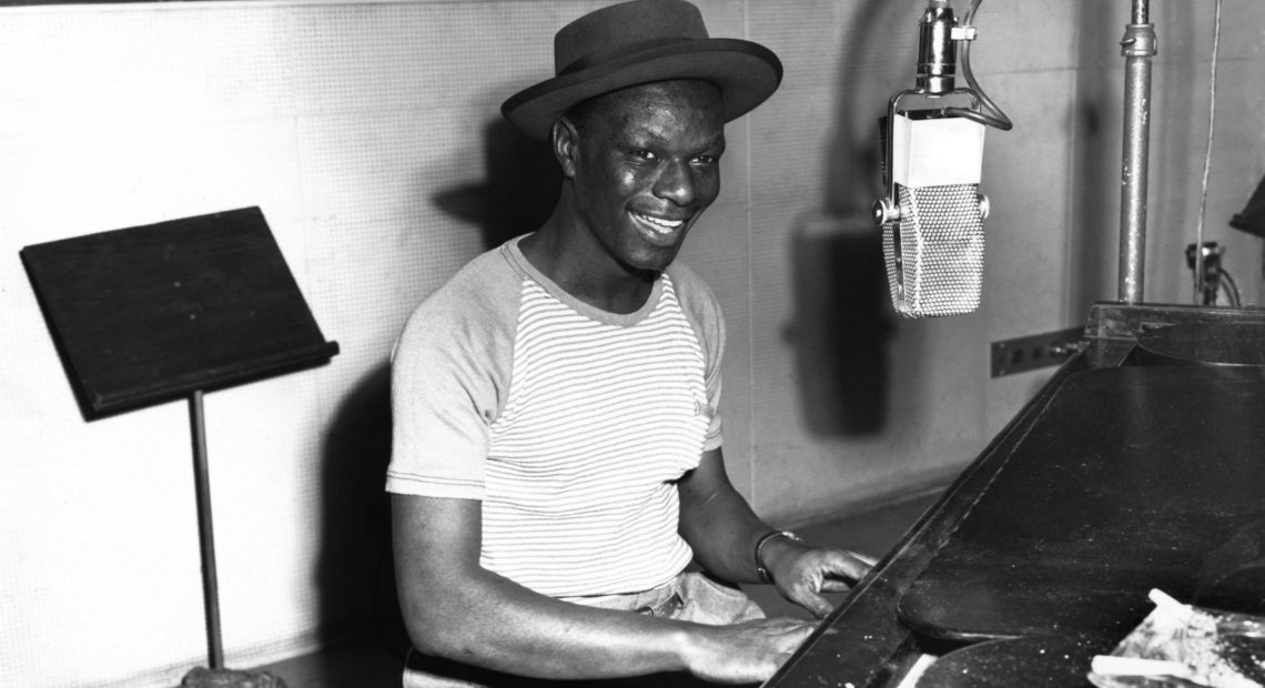 Nat King Cole playing piano in the Capitol Records recording studio on May 23, 1945. Capitol Records Photo Archive/Courtesy of the artist