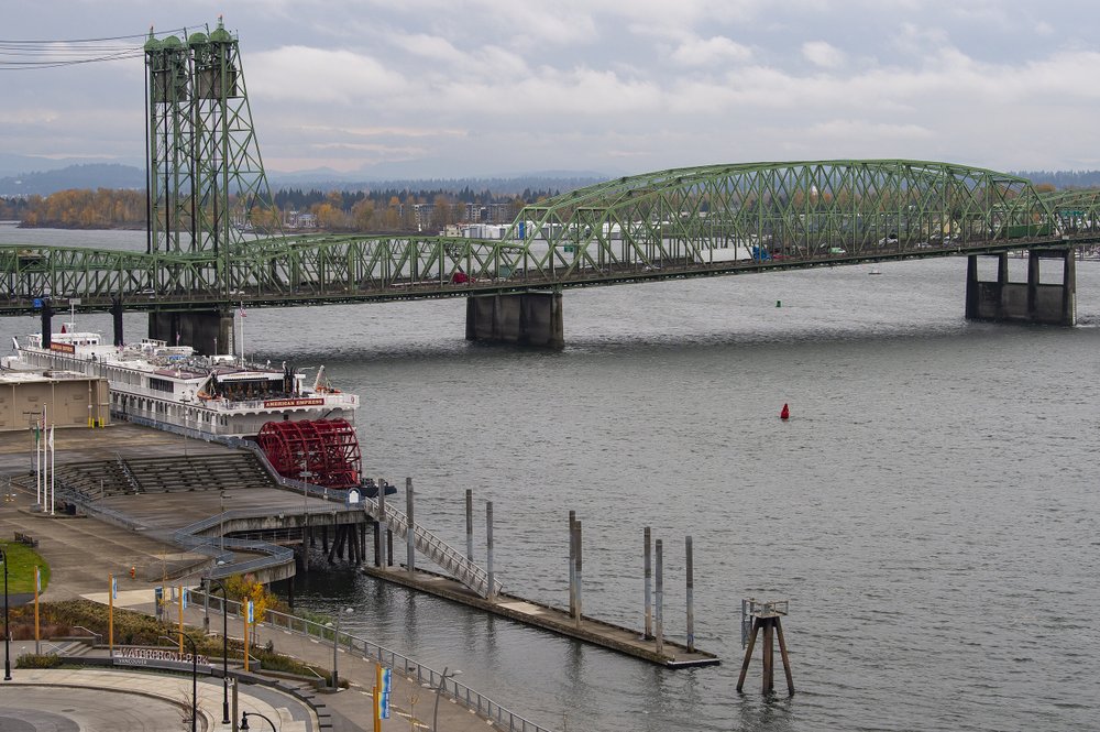 The Interstate 5 bridge is seen here from the Washington side on Monday, Nov. 18, 2019. The governors of Washington and Oregon are meeting to announce their joint plan to revive the Columbia River Crossing project. The project seeks to replace the aging Interstate 5 bridge over the Columbia River. CREDIT: Nathan Howard/The Columbian via AP