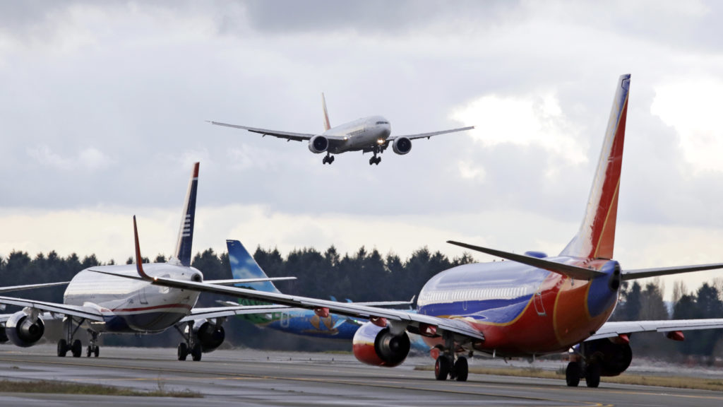 Commercial air travel currently accounts for just about 2.5% of global carbon emissions, but those emissions are rising fast. CREDIT: Elaine Thompson/AP