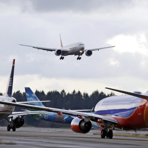 Commercial air travel currently accounts for just about 2.5% of global carbon emissions, but those emissions are rising fast. CREDIT: Elaine Thompson/AP