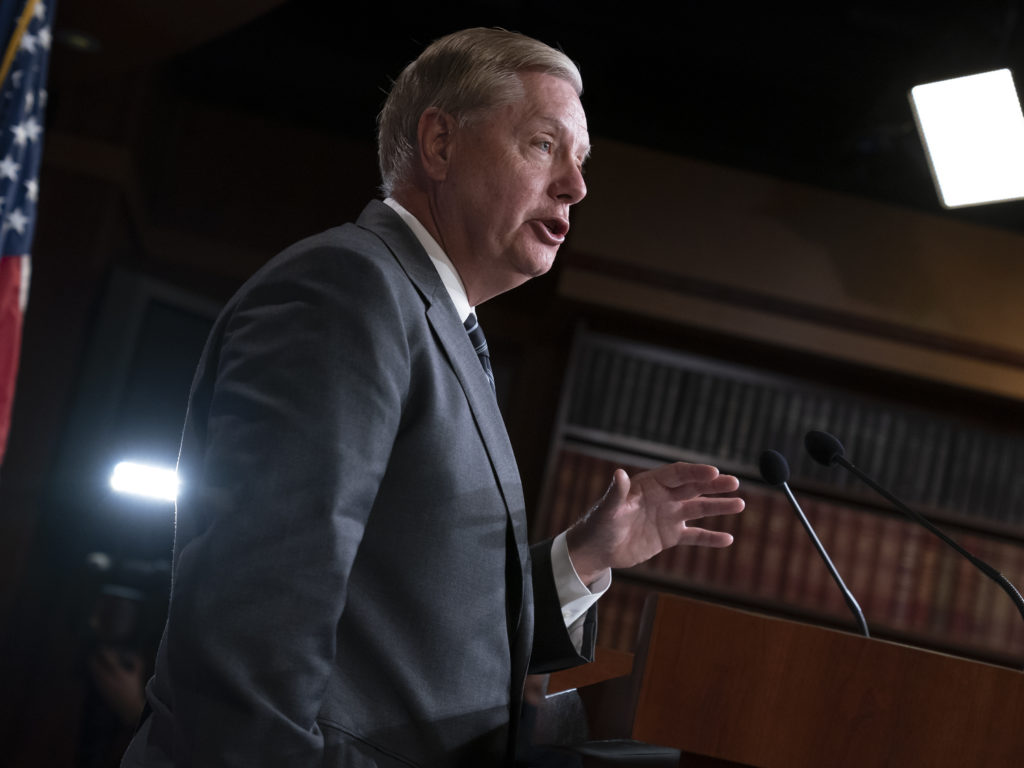 Trump ally Sen. Lindsey Graham shared that White House officials are still holding out hope that the president may not get impeached by the House of Representatives. CREDIT: J. Scott Applewhite/AP