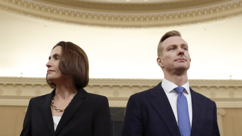 Former White House national security aide Fiona Hill and David Holmes, a U.S. diplomat in Ukraine, return from a break to continue their testimony before the House Intelligence Committee on Thursday. Andrew Harnik/AP