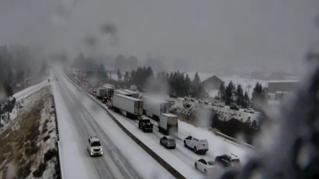 In this still image taken from a Caltrans remote video traffic camera, multiple spinouts bring traffic to a halt Tuesday on Interstate 80 in Truckee, Calif. CREDIT: Caltrans via AP