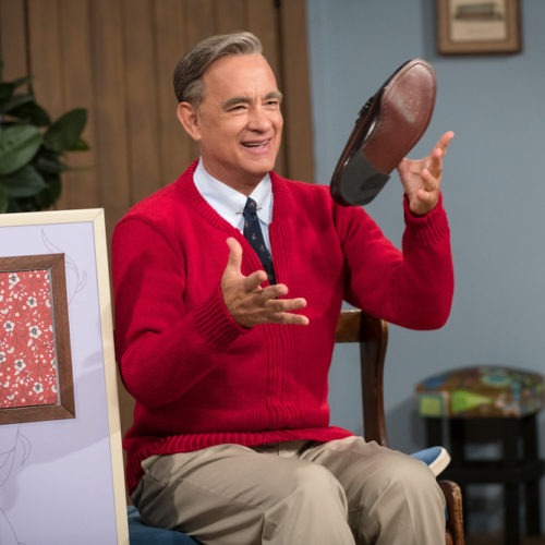 Tom Hanks stars as Fred Rogers in A Beautiful Day in the Neighborhood. Hanks watched a lot of Mister Rogers to research the role and found as an adult, you don't really "get it": "Why is it taking so long? What's the big deal? What are these fish?" CREDIT: Lacey Terrell/CTMG