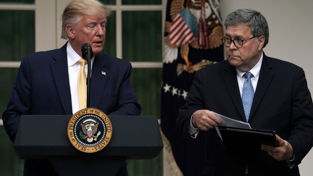 President Trump and U.S. Attorney General William Barr announce the Trump administration's decision to back down from its push for a citizenship question in the White House Rose Garden in July. CREDIT: Alex Wong/Getty Images