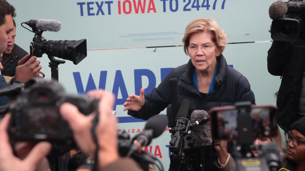 Sen. Elizabeth Warren speaks to reporters in Des Moines, Iowa, on Friday, after releasing her plan to pay for single-payer health care. Scott Olson/Getty Images