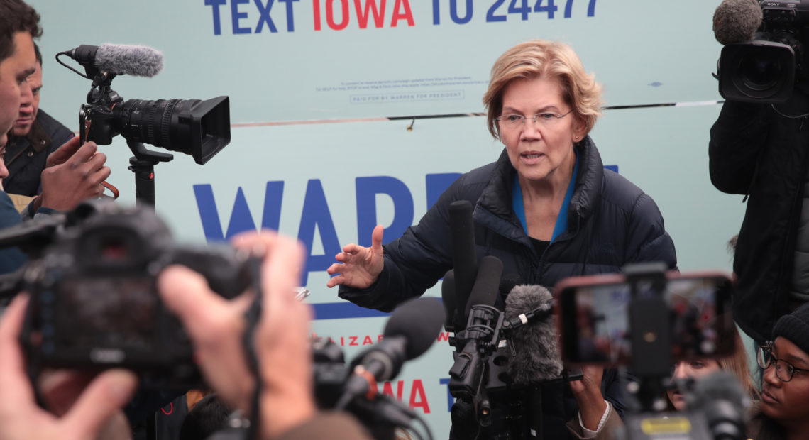 Sen. Elizabeth Warren speaks to reporters in Des Moines, Iowa, on Friday, after releasing her plan to pay for single-payer health care. Scott Olson/Getty Images