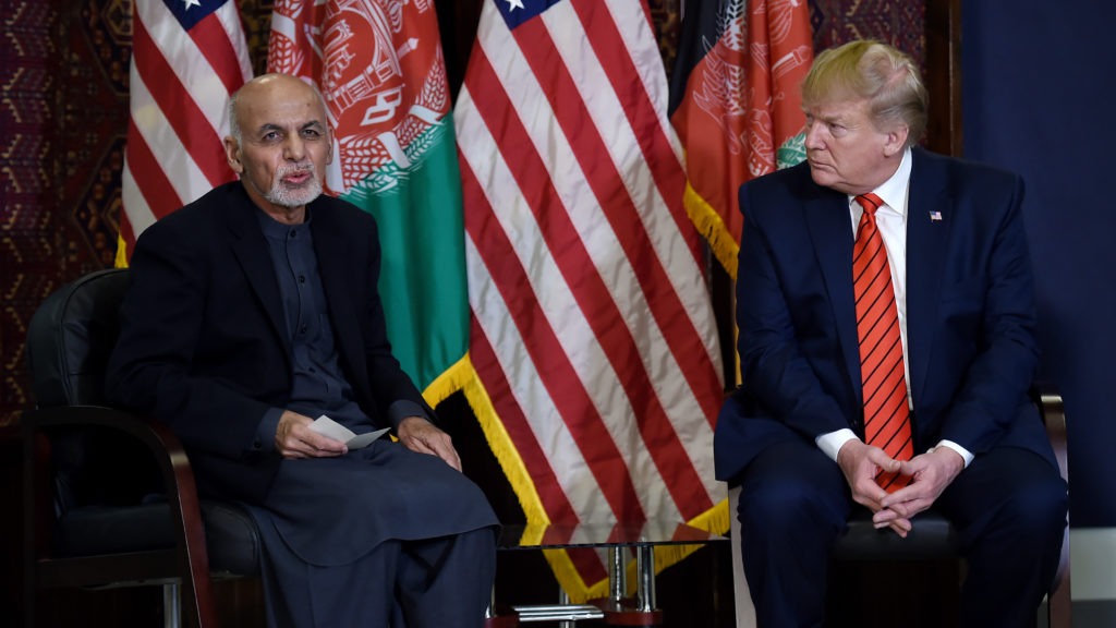 President Trump meets with Afghan President Ashraf Ghani during a surprise Thanksgiving 2019 visit to Bagram Airfield, just outside Kabul. CREDIT: Olivier Douliery/AFP via Getty Images