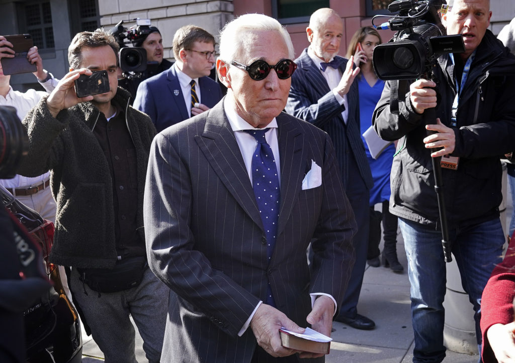 Former Trump adviser Roger Stone leaves a Washington, D.C., courthouse Friday after being found guilty of obstructing a congressional investigation into Russia's interference in the 2016 election. CREDIT: Win McNamee/Getty Images