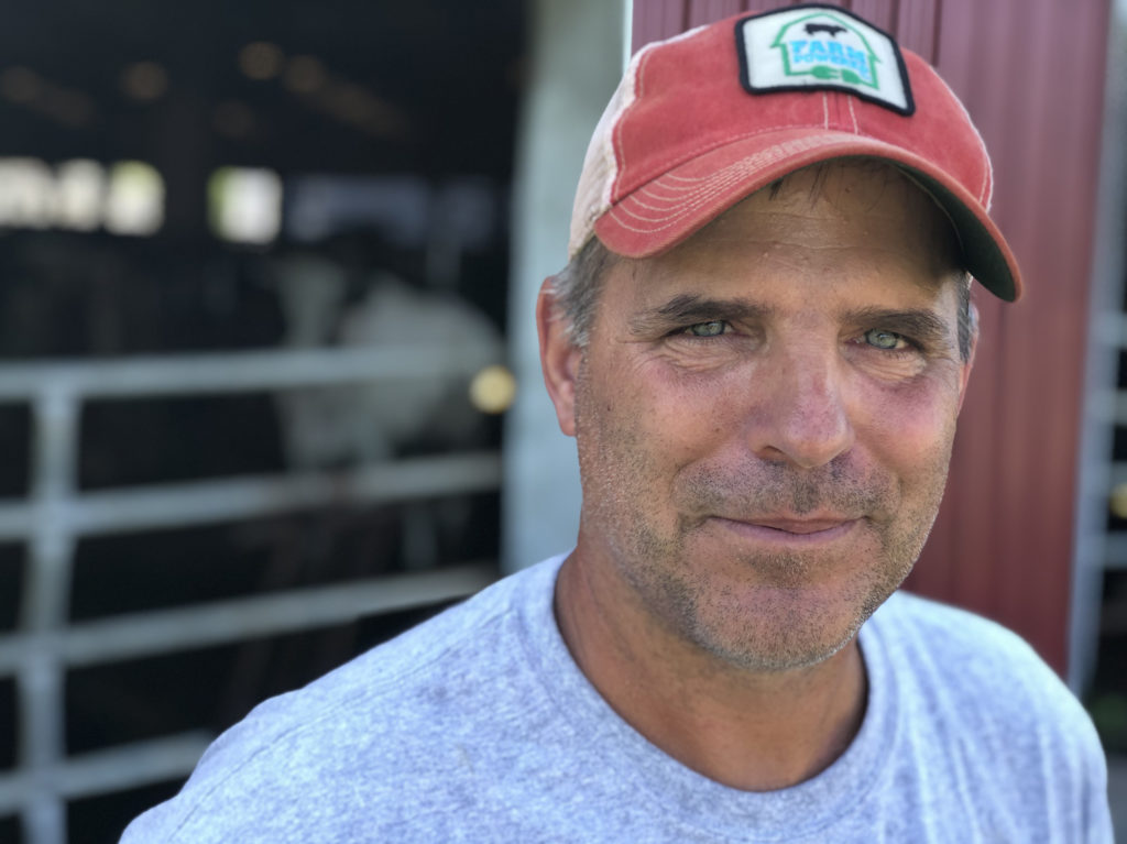 Peter Melnik, a fourth-generation dairy farmer, owns Bar-Way Farm, Inc. in Deerfield, Mass. He has an anaerobic digester on his farm that converts food waste into renewable energy. CREDIT: Allison Aubrey/NPR