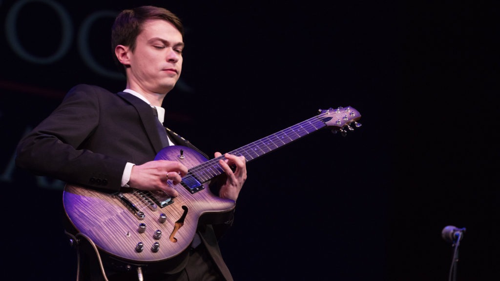 Evgeny Pobozhiy, winner of the Herbie Hancock International Jazz Guitar Competition, performing at the Kennedy Center on Dec. 3, 2019. CREDIT: Steve Mundinger/Courtesy of the Hancock Institute