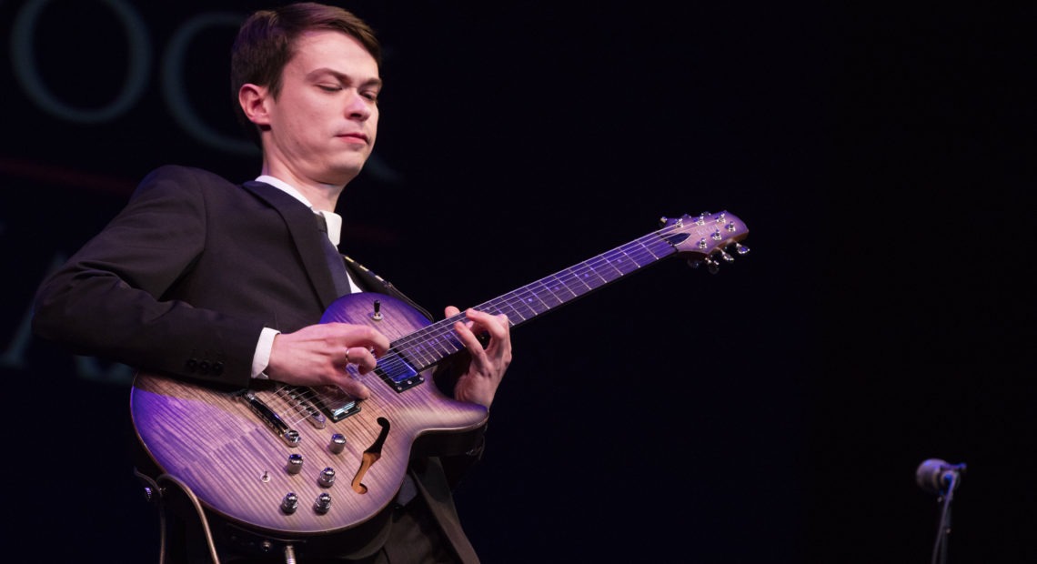 Evgeny Pobozhiy, winner of the Herbie Hancock International Jazz Guitar Competition, performing at the Kennedy Center on Dec. 3, 2019. CREDIT: Steve Mundinger/Courtesy of the Hancock Institute