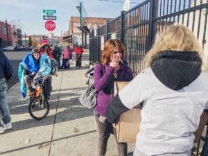 Group of WSU students leading volunteer group around Spokane