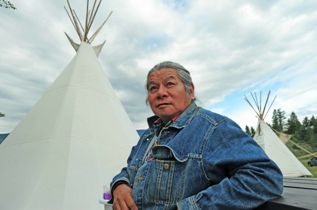 Alfred Joseph, Chief of Akisq’nuk First Nation in British Columbia, a contributing author to “Healing The Big River.” Joseph tells of when his grandfather waited on salmon to arrive upstream. None did. Later they learned that Grand Coulee Dam had been built. “We are still waiting,” he said.
