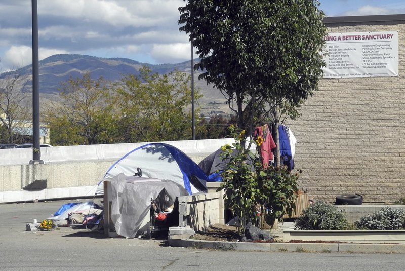 This undated file photo shows the entrance to an alley known as Cooper Court, a homeless camp in Boise, Idaho. A federal appellate court says cities can't prosecute people for sleeping on the streets if they have nowhere else to go. CREDIT: Adam Cotterell/Boise State Public Radio via AP