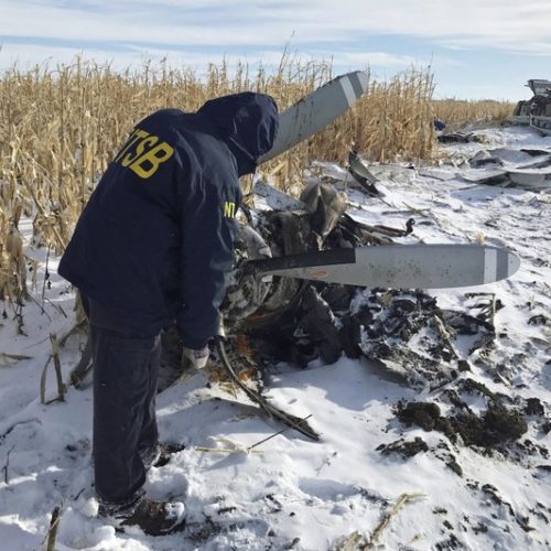 In this Dec. 2, 2019, photo provided by the National Transportation Safety Board, an NTSB investigator begins the examination of the wreckage of the Pilatus PC-12 that crashed in Chamberlain, S.D., on Nov. 30 shortly after departure from Chamberlain Municipal Airport. CREDIT: NTSB via AP