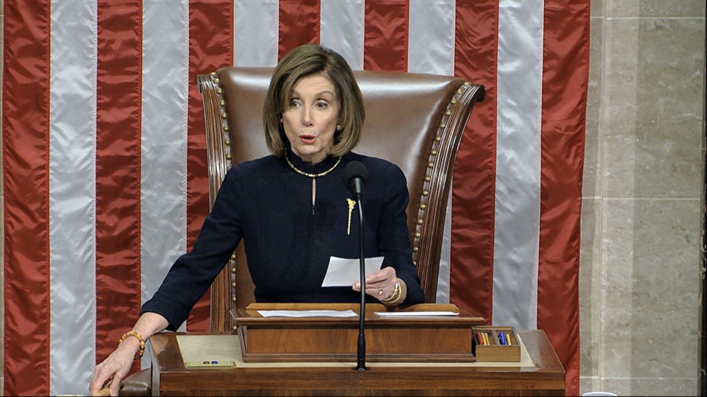 House Speaker Nancy Pelosi, D-Calif., announces the passage of the first article of impeachment, abuse of power, against President Trump by the House of Representatives on Wednesdsay. CREDIT: House Television via AP