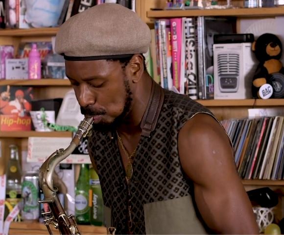 King Shabaka plays baritone saxophone for the group The Comet is Coming