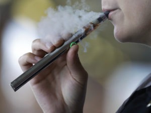 Congress is trying to crack down on teenagers and young adults using tobacco products, including e-cigarettes.