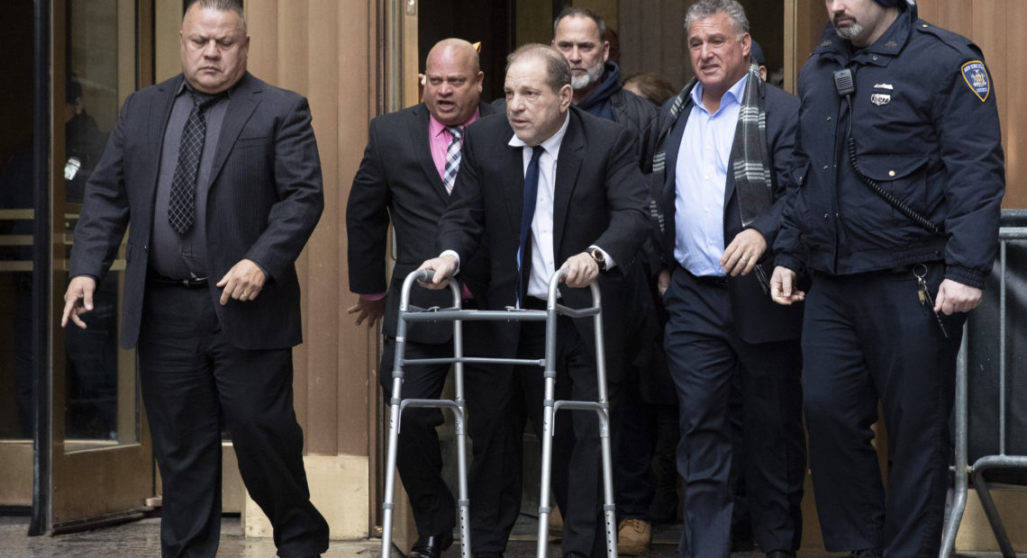 Harvey Weinstein leaves court following a hearing over allegations he violated bail conditions by mishandling his electronic ankle monitor in New York. CREDIT: Mark Lennihan/AP