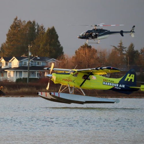 A de Havilland Beaver floatplane converted to electric battery-powered propulsion prepares to land on the Fraser River in Richmond, British Columbia. CREDIT: Tom Banse/N3