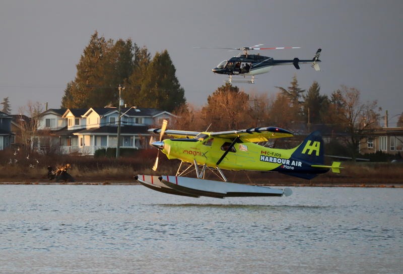 A de Havilland Beaver floatplane converted to electric battery-powered propulsion prepares to land on the Fraser River in Richmond, British Columbia. CREDIT: Tom Banse/N3