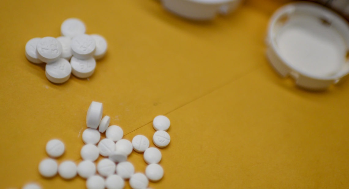 Millions of Americans sank into addiction after using potent opioid painkillers, such as acetaminophen/oxycodone, that companies churned out and doctors freely prescribed over the past two decades. CREDIT: Eric Baradat /AFP via Getty Images