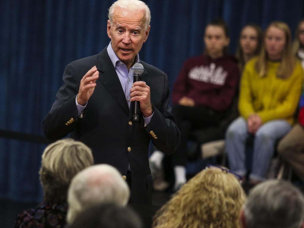 Former Vice President Joe Biden at a town hall last month. On Thursday, Biden got into a heated exchange with an Iowa voter, calling the man a "damn liar." CREDIT: Boston Globe via Getty Images