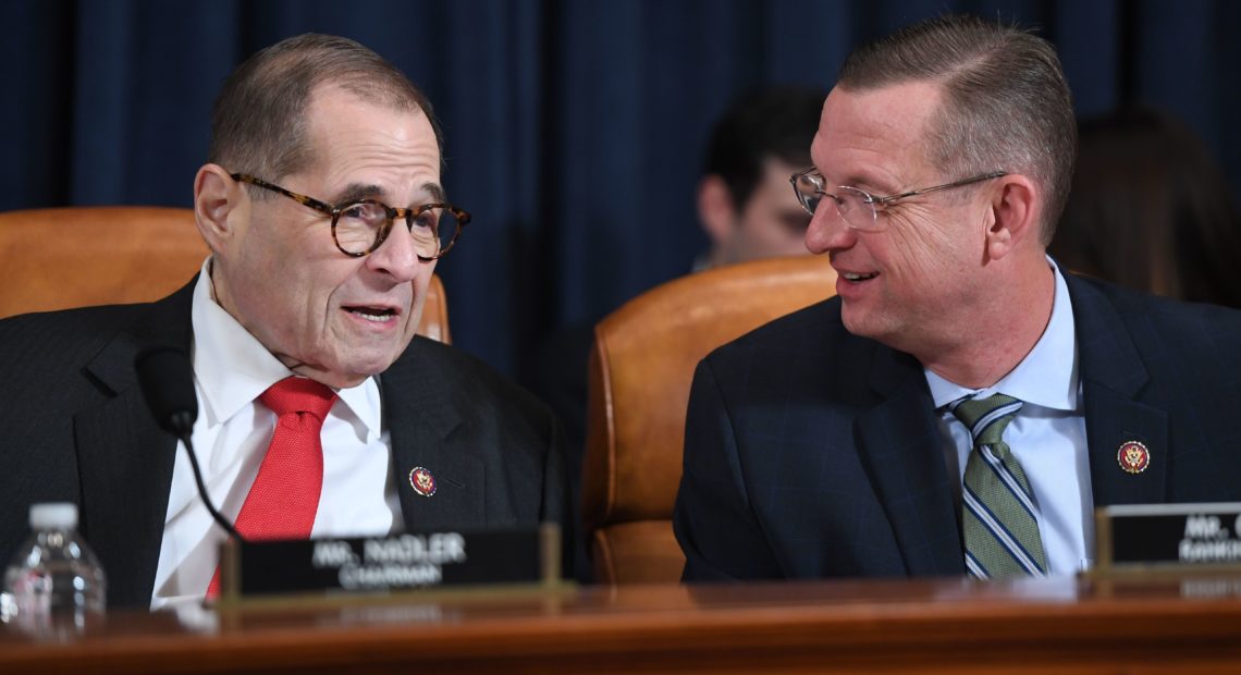 House Judiciary Chairman Jerry Nadler, D-N.Y., speaks with ranking member Doug Collins, R-Ga., at Monday's impeachment hearing. CREDIT: Saul Loeb/AFP via Getty Images