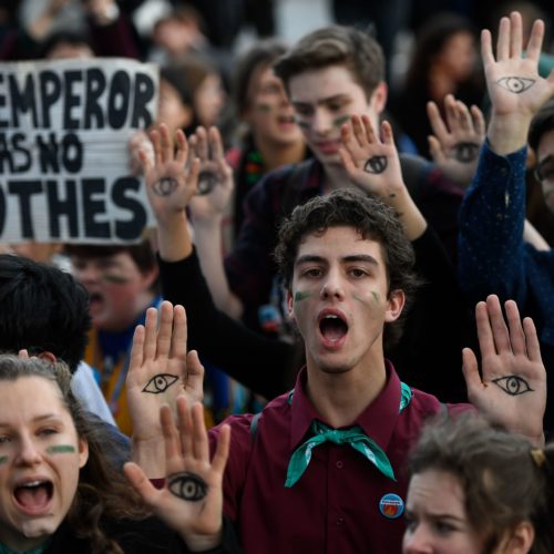 Demonstrators take part in a protest on climate emergency outside the U.N. Climate Change Conference COP25 in Madrid on Friday. CREDIT: Pierre-Philippe Marcou/AFP via Getty Images