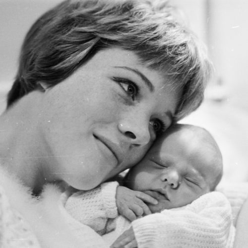 Julie Andrews poses with baby Emma in November 1962. Andrews began filming Mary Poppins a few months after Emma's birth. CREDIT: McCabe/Getty Images