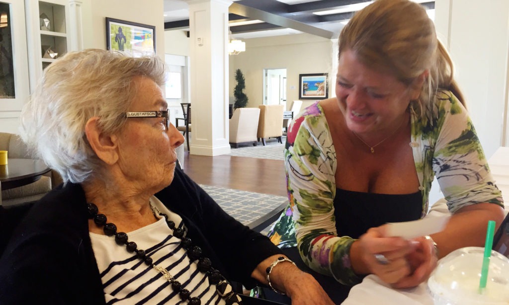 Nancy Gustafson (right), an opera singer, used singing to reconnect with her mother, Susan Gustafson, who had dementia and was barely talking. She says her mom started joking and laughing with her again after they sang together. CREDIT: Emily Becker/Songs by Heart