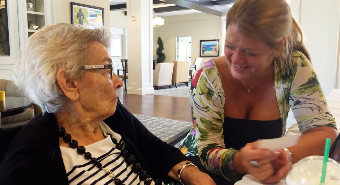 Nancy Gustafson (right), an opera singer, used singing to reconnect with her mother, Susan Gustafson, who had dementia and was barely talking. She says her mom started joking and laughing with her again after they sang together. CREDIT: Emily Becker/Songs by Heart