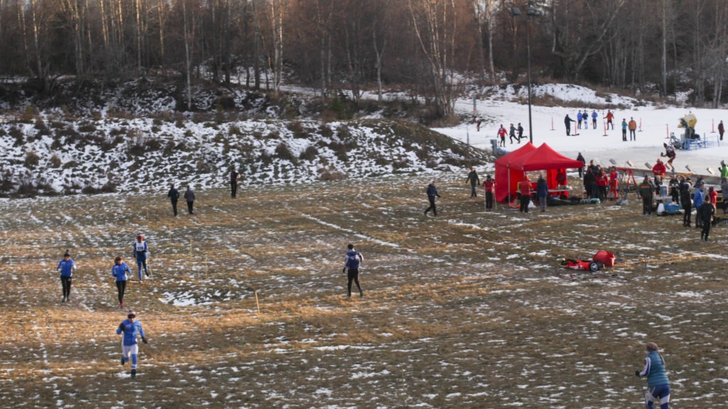 High school skiers warm up for the annual Lynx Loppet race at Kincaid Park. Competitors had to warm up by running with their ski poles. Nat Herz/Alaska's Energy Desk