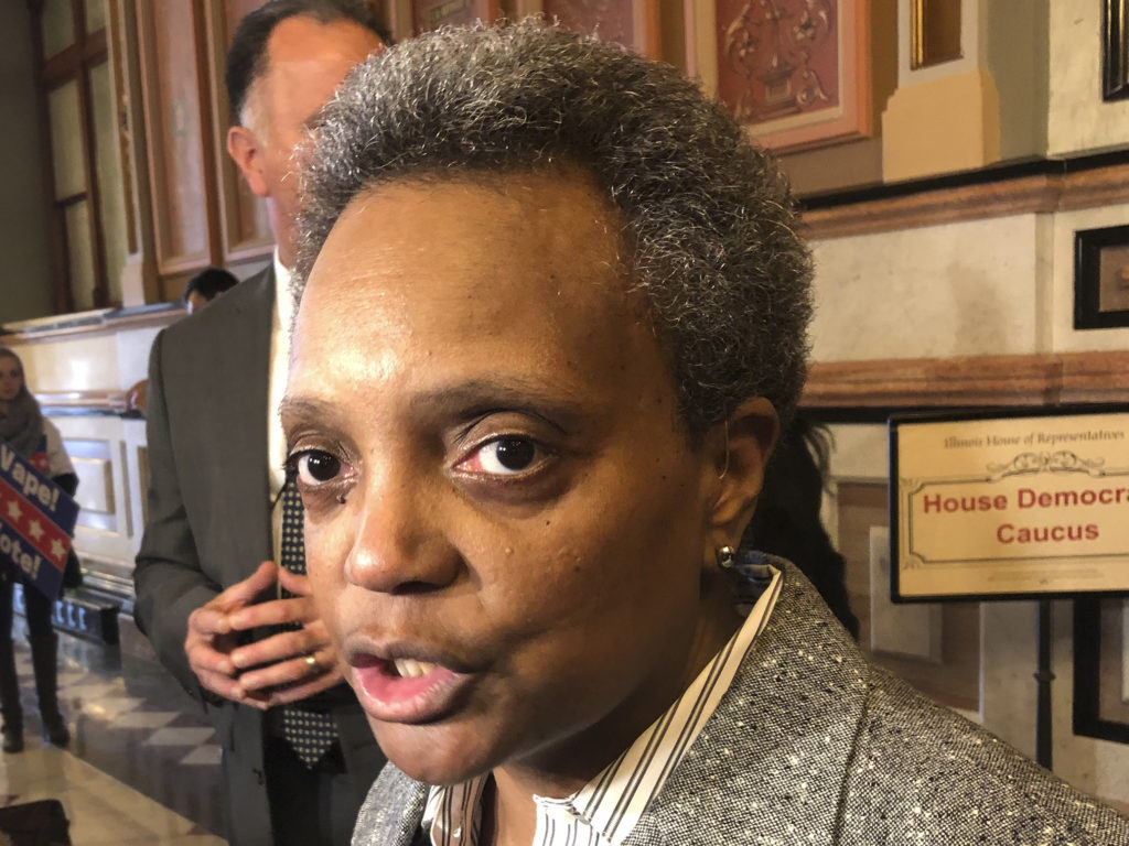 Chicago Mayor Lori Lightfoot is urging potential witnesses of the shooting to come forward and assist police with the investigation. "We can't normalize this kind of behavior," she said. John O'Connor/AP