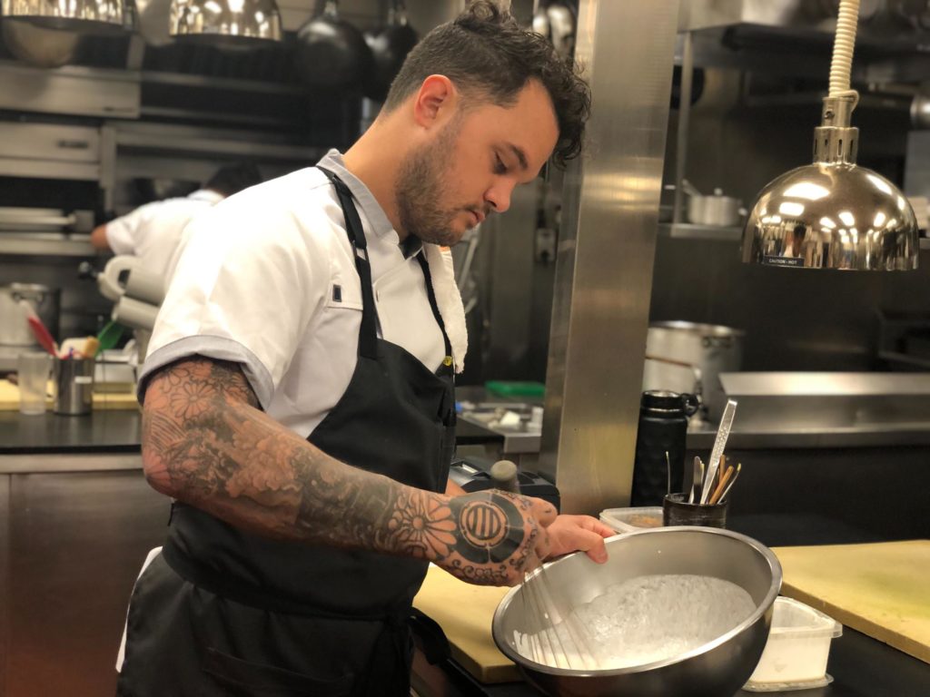 Brady Williams, the executive chef of Canlis in Seattle, whips together cream seasoned with bigleaf maple syrup for a caviar dish. He recently won the James Beard award.