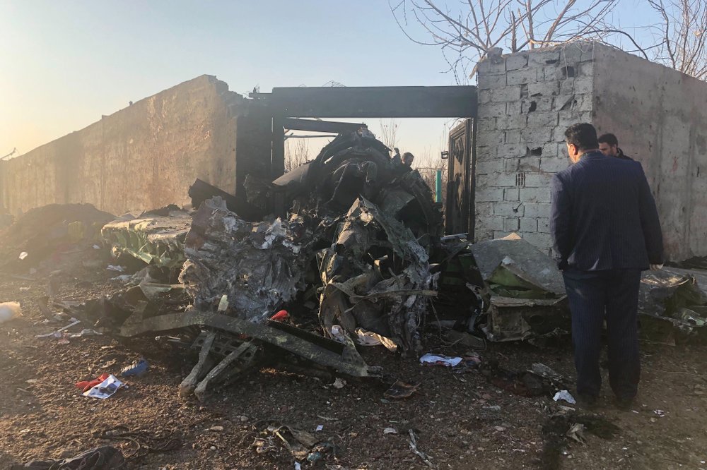 Debris from a plane crash on the outskirts of Tehran, Iran. A Ukrainian airplane carrying at least 170 people crashed on Wednesday, Jan. 8, shortly after takeoff from Tehran’s main airport, killing all on board. CREDIT: Mohammad Nasiri/AP