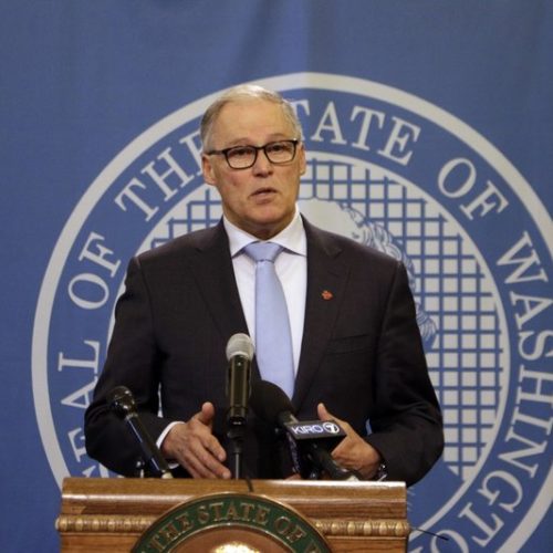 Washington Gov. Jay Inslee talks to news media Jan. 16, 2020, after a state Supreme Court ruling that reinstated a severely limited version of his plan to cap carbon pollution in the state. He said the ruling just strengthens his commitment to get climate change-related bills through the Legislature this year. CREDIT: Rachel La Corte/AP