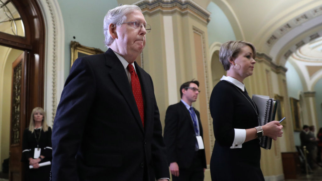Senate Majority Leader Mitch McConnell, R-Ky., walks out of the Senate Chamber before the start of President Trump's impeachment trial on Tuesday. CREDIT: Chip Somodevilla/Getty Images